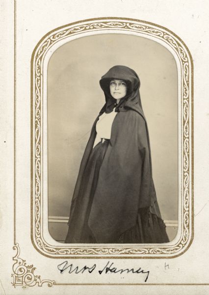 Cordelia A.P. Harvey Carte-de-visite portrait of Cordelia Harvey wearing a hooded cape.