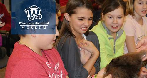 Children exploring exhibit at the Wisconsin Historical Society Museum.