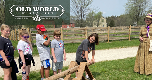 Children exploring exhibit on the Madeline Island Museum.